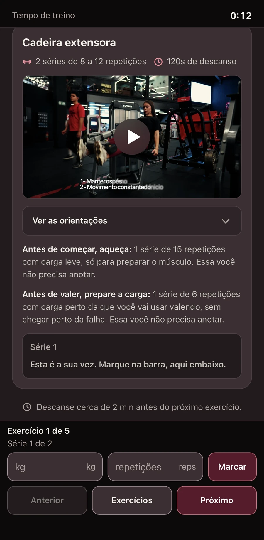 Treino em andamento, com o vídeo da demonstração, a orientação de aquecimento e o campo para marcar a carga